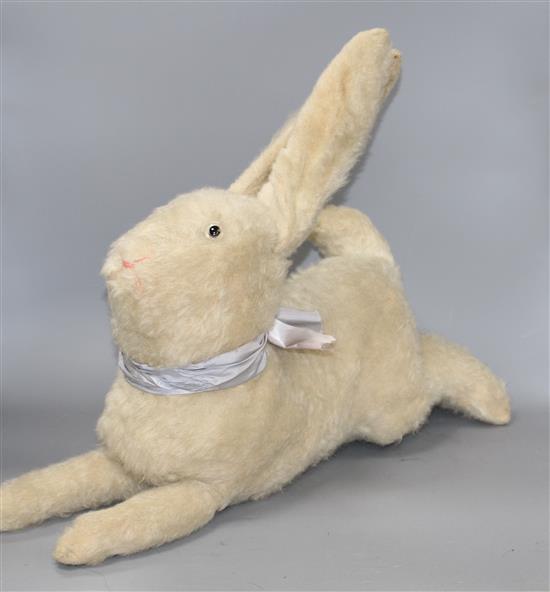 A collection of assorted modern and vintage soft toys including Steiff